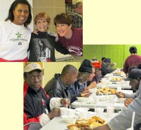 People eating at a table at St. Francis Table Feed the Hungry Ministry