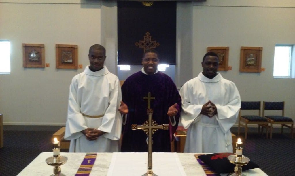 Fr. Mark and two Acolytes