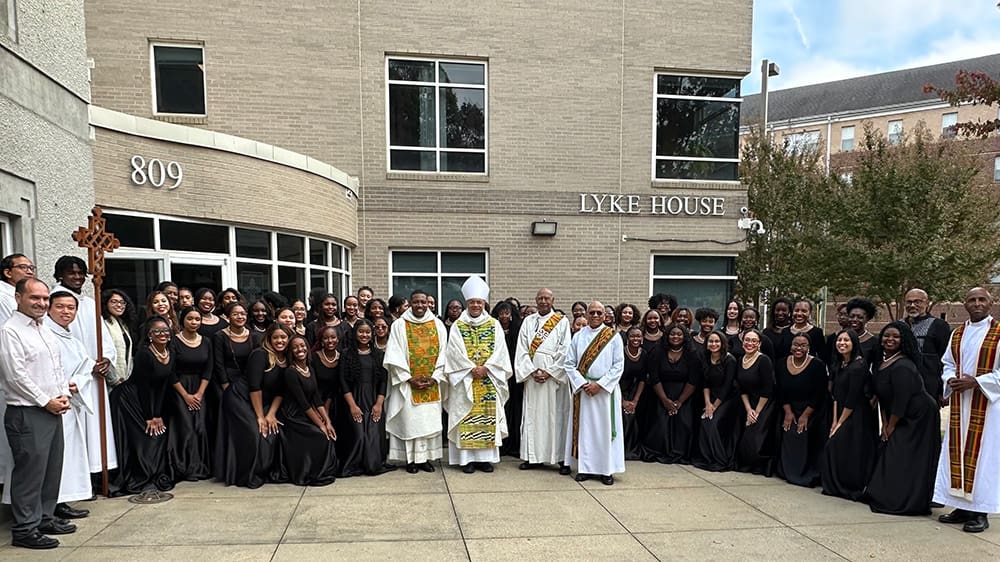 Outside Lykehouse with celebrants, servers, and choir before the 25th anniversary dedication mass